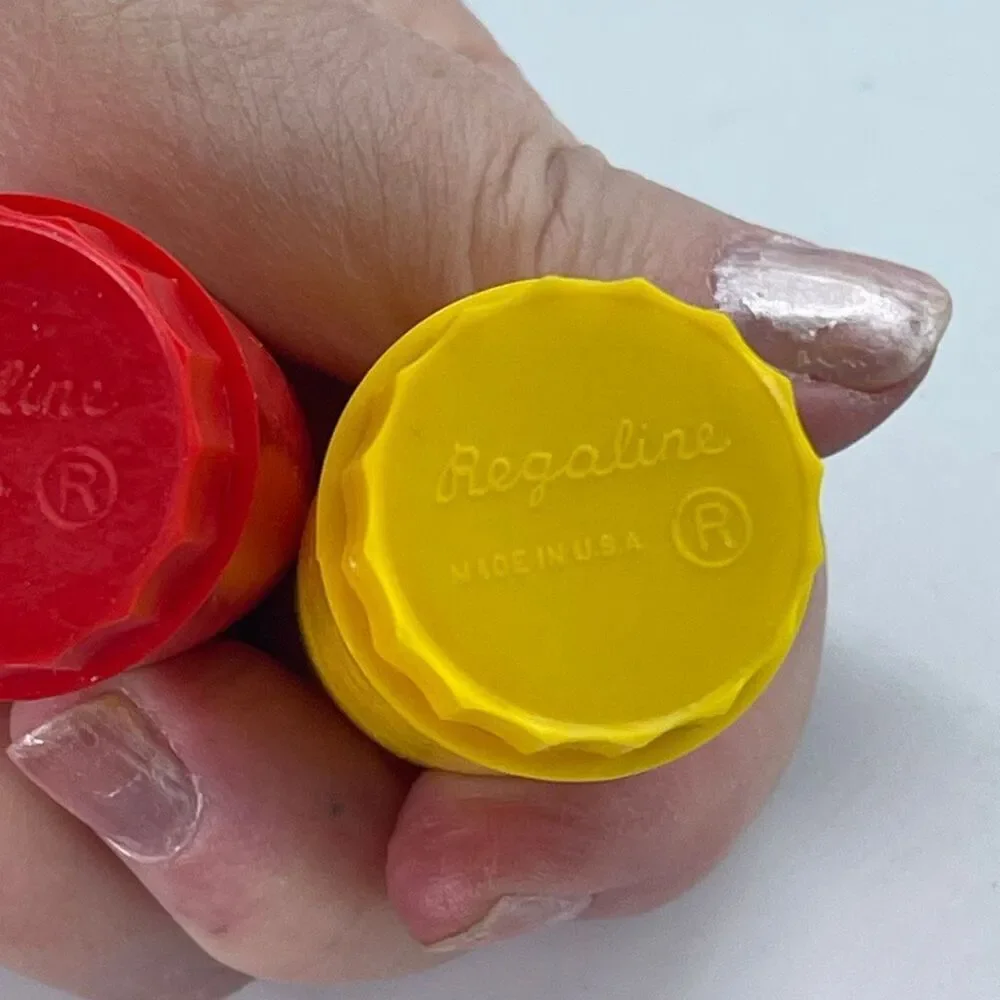 Vintage Midcentury Regaline USA mini salt n pepper shakers.